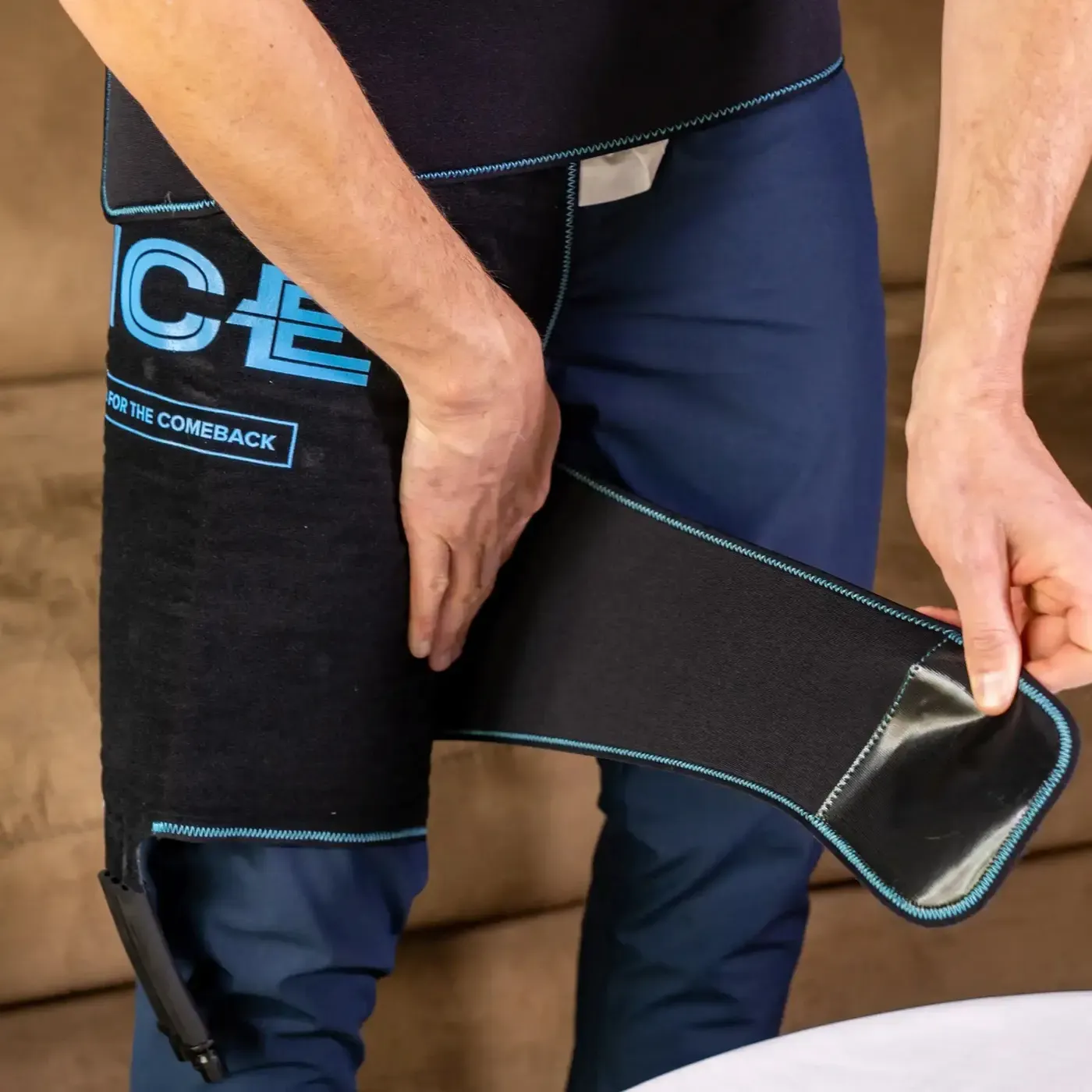The NICE hip wrap being fitted and strapped at the hip